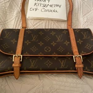$1600 vintage Louis Vuitton Marelle bag.